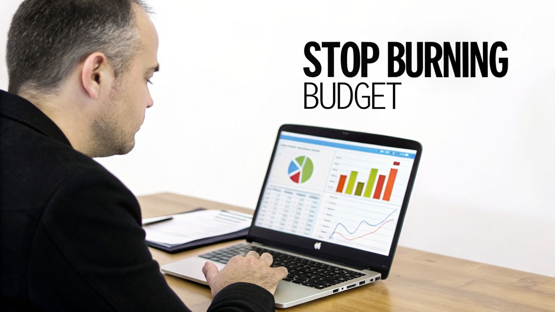Man analyzing financial data on a laptop, with text 'STOP BURNING BUDGET' in the background.