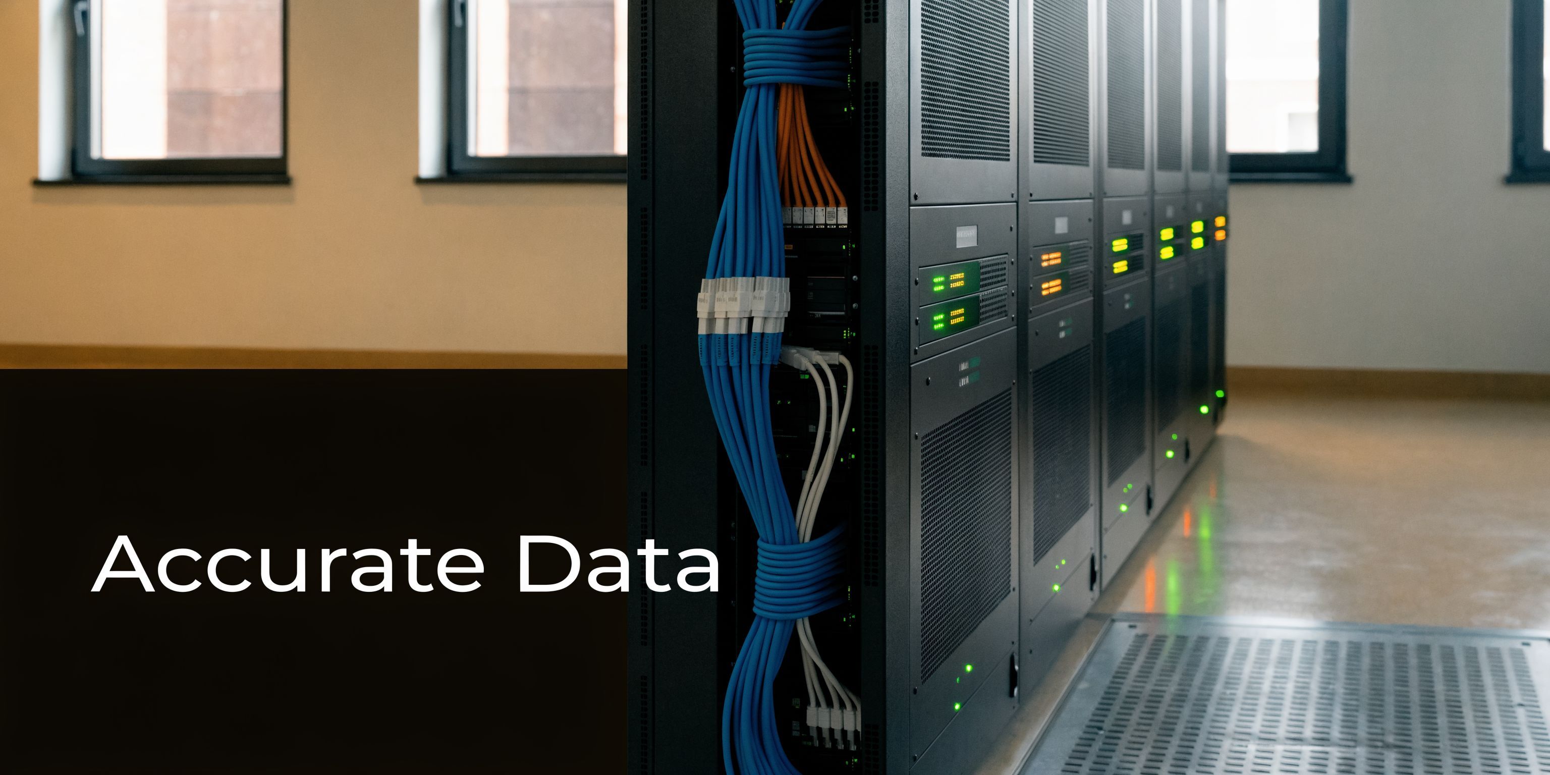 A server rack in a data center with blue and white network cables and glowing status lights.